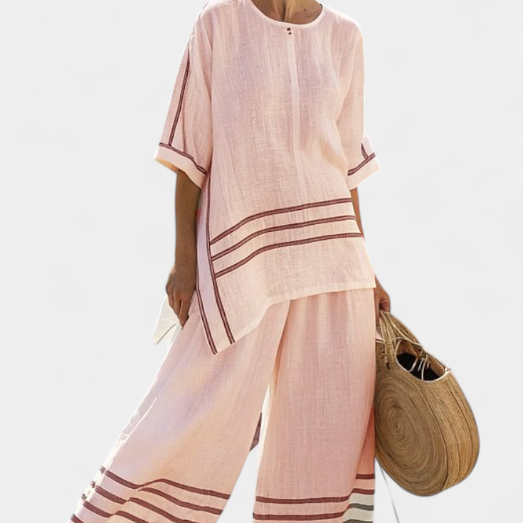 Sukienka z szerokimi paskami i asymetrycznym krojem - nowoczesny i wygodny styl