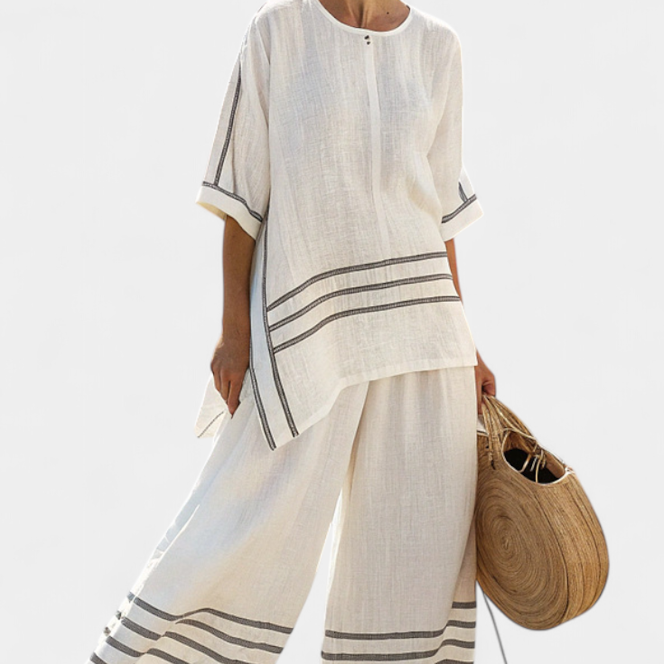 Sukienka z szerokimi paskami i asymetrycznym krojem - nowoczesny i wygodny styl